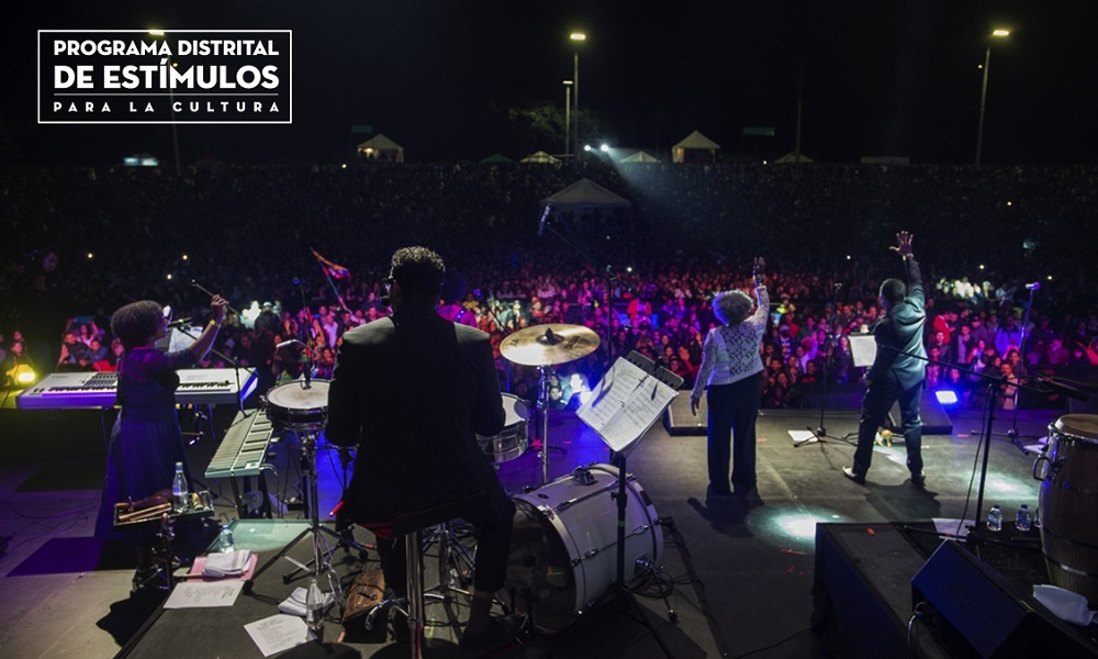 Orquesta y público del festival 