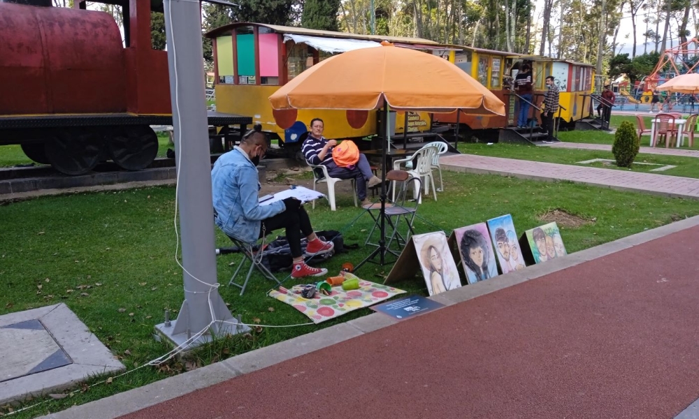 Dibujantes de Arte a la KY en calle del Parque de los Novios