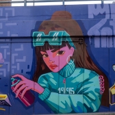 Grafiti en el corredor vial de la Calle 26, en Bogotá.
