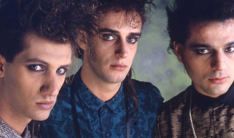 Integrantes de Soda Stereo maquillados. 